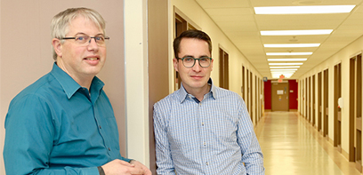 Drs. Van Uum and Greff in their laboratory